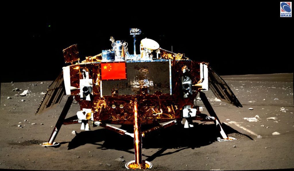 robot with chinese flag on moon